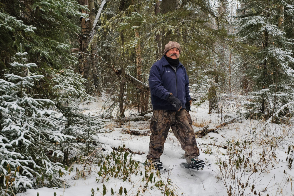 a man snowshoeing